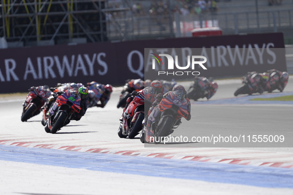 Jorge Martin of Spain and Prima Pramac Racing rides on track in front of Francesco Bagnaia of Italy and Ducati Lenovo Team during the Sprint...