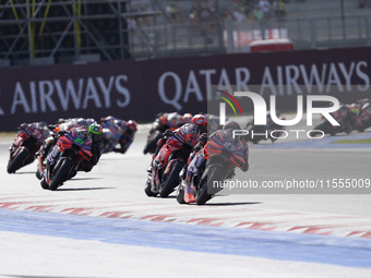 Jorge Martin of Spain and Prima Pramac Racing rides on track in front of Francesco Bagnaia of Italy and Ducati Lenovo Team during the Sprint...