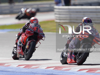 Jorge Martin of Spain and Prima Pramac Racing rides on track in front of Francesco Bagnaia of Italy and Ducati Lenovo Team during the Sprint...