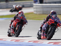 Jorge Martin of Spain and Prima Pramac Racing rides on track in front of Francesco Bagnaia of Italy and Ducati Lenovo Team during the Sprint...