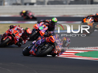 Jorge Martin of Spain and Prima Pramac Racing rides on track in front of Francesco Bagnaia of Italy and Ducati Lenovo Team during the Sprint...