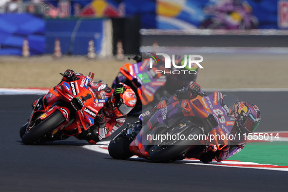 Jorge Martin of Spain and Prima Pramac Racing rides on track in front of Francesco Bagnaia of Italy and Ducati Lenovo Team during the Sprint...