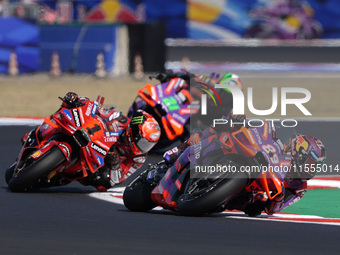 Jorge Martin of Spain and Prima Pramac Racing rides on track in front of Francesco Bagnaia of Italy and Ducati Lenovo Team during the Sprint...