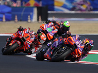 Jorge Martin of Spain and Prima Pramac Racing rides on track in front of Francesco Bagnaia of Italy and Ducati Lenovo Team during the Sprint...