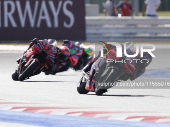 Jorge Martin of Spain and Prima Pramac Racing rides on track in front of Francesco Bagnaia of Italy and Ducati Lenovo Team during the Sprint...