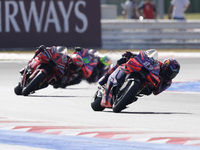 Jorge Martin of Spain and Prima Pramac Racing rides on track in front of Francesco Bagnaia of Italy and Ducati Lenovo Team during the Sprint...