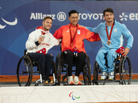 Alfie Hewett of the UK on the left, Tokito Oda of Japan in the center, and Gustavo Fernandez on the right stand on the podium for Wheelchair...