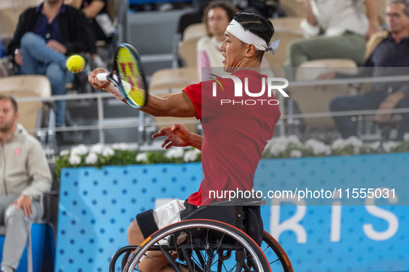 Tokito Oda of Japan competes in the Wheelchair Tennis Men's Singles Gold Medal Match against Alfie Hewett of the UK on Court Philippe Chatri...