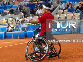 Tokito Oda of Japan competes in the Wheelchair Tennis Men's Singles Gold Medal Match against Alfie Hewett of the UK on Court Philippe Chatri...