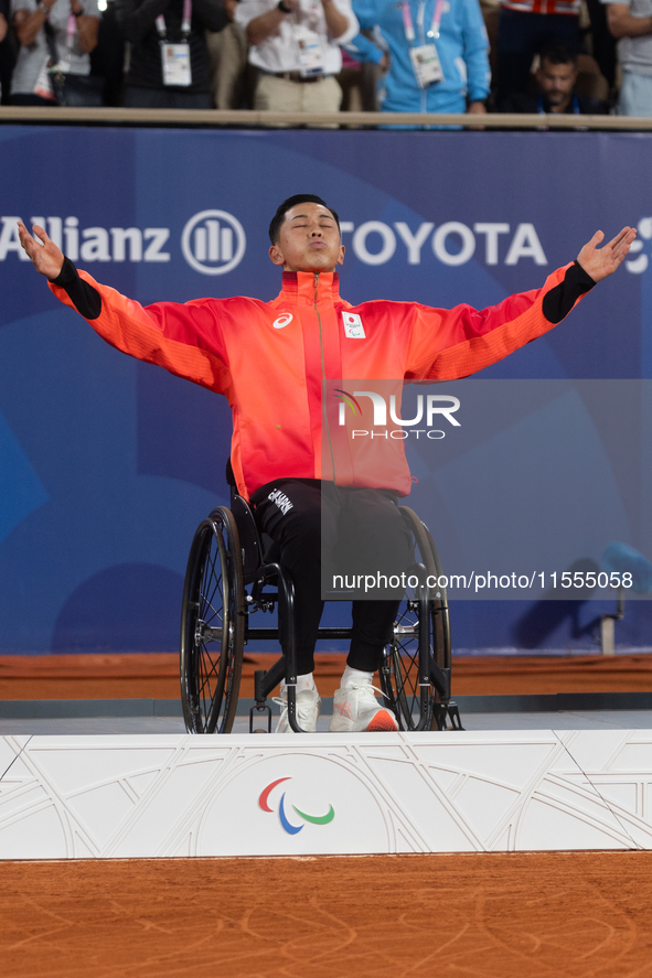 Tokito Oda of Japan reacts on the podium for the gold medal during the Wheelchair Tennis - Men's Singles Gold Medal Match victory ceremony o...