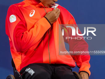 Tokito Oda of Japan reacts on the podium for the gold medal during the Wheelchair Tennis - Men's Singles Gold Medal Match victory ceremony o...