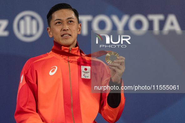 Tokito Oda of Japan reacts on the podium for the gold medal during the Wheelchair Tennis - Men's Singles Gold Medal Match victory ceremony o...