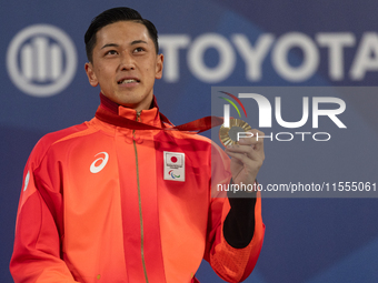 Tokito Oda of Japan reacts on the podium for the gold medal during the Wheelchair Tennis - Men's Singles Gold Medal Match victory ceremony o...