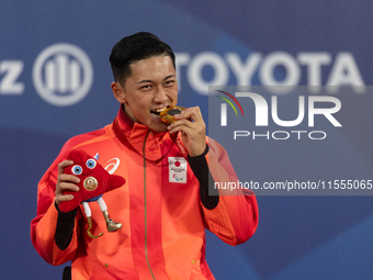 Tokito Oda of Japan reacts on the podium for the gold medal during the Wheelchair Tennis - Men's Singles Gold Medal Match victory ceremony o...