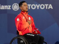 Tokito Oda of Japan reacts on the podium for the gold medal during the Wheelchair Tennis - Men's Singles Gold Medal Match victory ceremony o...