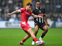 Connor O'Brien of Accrington Stanley is under pressure from Jacob Bedeau of Notts County during the Sky Bet League 2 match between Notts Cou...