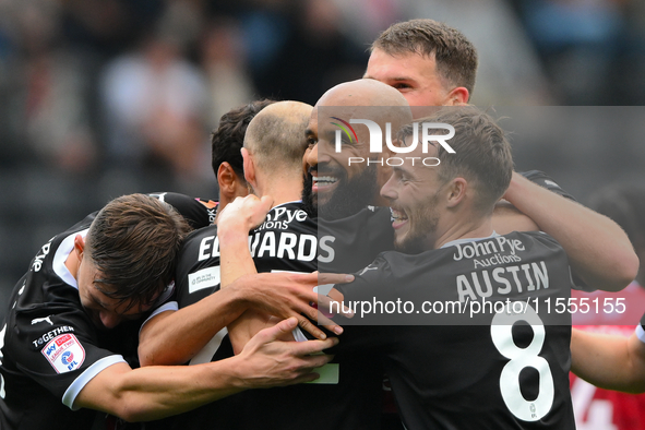 David McGoldrick of Notts County celebrates his second goal with his teammates during the Sky Bet League 2 match between Notts County and Ac...