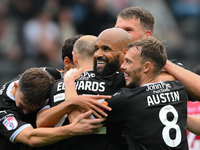 David McGoldrick of Notts County celebrates his second goal with his teammates during the Sky Bet League 2 match between Notts County and Ac...