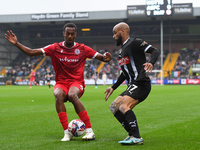 Zach Awe of Accrington Stanley is under pressure from David McGoldrick of Notts County during the Sky Bet League 2 match between Notts Count...