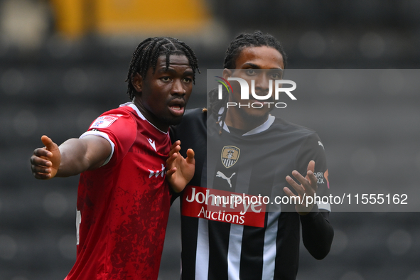 Nelson Khumbeni of Accrington Stanley and Jevani Brown of Notts County during the Sky Bet League 2 match between Notts County and Accrington...