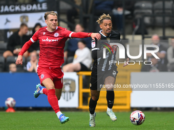 Alex Henderson of Accrington Stanley and Kellan Gordon of Notts County during the Sky Bet League 2 match between Notts County and Accrington...