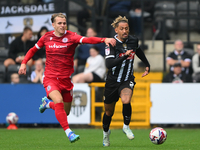 Alex Henderson of Accrington Stanley and Kellan Gordon of Notts County during the Sky Bet League 2 match between Notts County and Accrington...