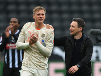 Alex Bass of Notts County and Stuart Maynard, manager of Notts County, celebrate victory during the Sky Bet League 2 match between Notts Cou...