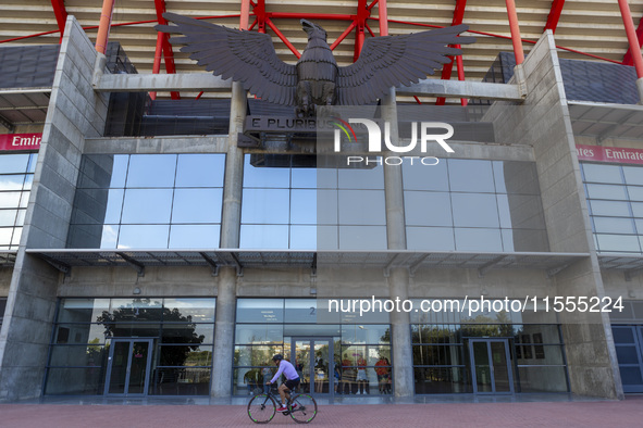 A person rides a bike at the Benfica ''Estadio da Luz'' in Lisbon, Portugal, on September 7, 2024. The soccer team has a new coach, Portugue...