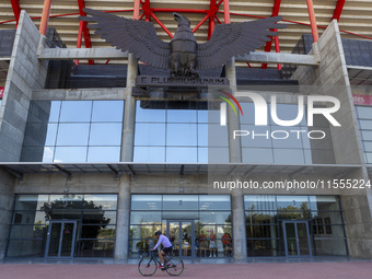 A person rides a bike at the Benfica ''Estadio da Luz'' in Lisbon, Portugal, on September 7, 2024. The soccer team has a new coach, Portugue...