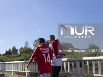 People walk near the Benfica ''Estadio da Luz'' in Lisbon, Portugal, on September 7, 2024. The soccer team has a new coach, Portuguese exper...