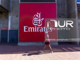 A person walks by an Emirates banner at the Benfica ''Estadio da Luz'' in Lisbon, Portugal, on September 7, 2024. The soccer team has a new...