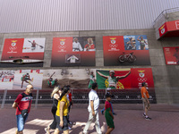 People walk by pictures of Olympians at the Benfica ''Estadio da Luz'' in Lisbon, Portugal, on September 7, 2024. The soccer team has a new...