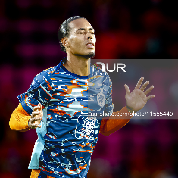 Netherlands defender Virgil van Dijk plays during the match between the Netherlands and Bosnia and Herzegovina at the Philips Stadium for th...