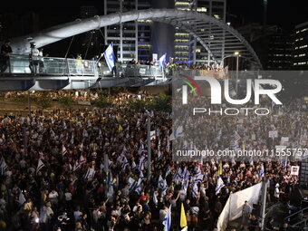 Thousands of Israelis protest against the Israeli government, calling for the immediate release of the hostages still held by Hamas in Gaza,...