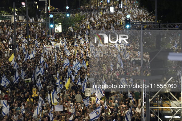 Thousands of Israelis protest against the Israeli government, calling for the immediate release of the hostages still held by Hamas in Gaza,...