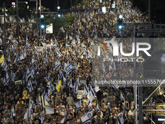 Thousands of Israelis protest against the Israeli government, calling for the immediate release of the hostages still held by Hamas in Gaza,...