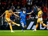 Netherlands forward Cody Gakpo and Bosnia and Herzegovina defender Jusuf Gazibegovic during the match between the Netherlands and Bosnia and...