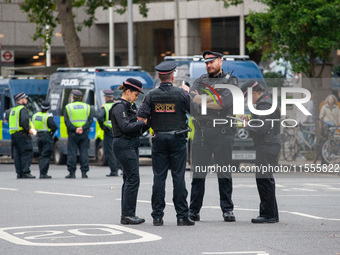 A heavy presence of Metropolitan Police officers is seen during the National Day of Action for Palestine in London, United Kingdom, on Septe...