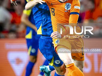 Bosnia and Herzegovina midfielder Benjamin Tahirovic and Netherlands midfielder Jerdy Schouten during the match between the Netherlands and...