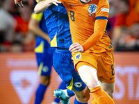 Bosnia and Herzegovina midfielder Benjamin Tahirovic and Netherlands midfielder Jerdy Schouten during the match between the Netherlands and...