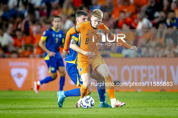 Bosnia and Herzegovina midfielder Benjamin Tahirovic and Netherlands midfielder Jerdy Schouten during the match between the Netherlands and...