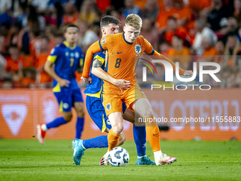 Bosnia and Herzegovina midfielder Benjamin Tahirovic and Netherlands midfielder Jerdy Schouten during the match between the Netherlands and...