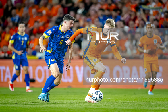 Bosnia and Herzegovina midfielder Benjamin Tahirovic and Netherlands midfielder Jerdy Schouten during the match between the Netherlands and...