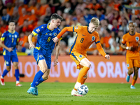 Bosnia and Herzegovina midfielder Benjamin Tahirovic and Netherlands midfielder Jerdy Schouten during the match between the Netherlands and...