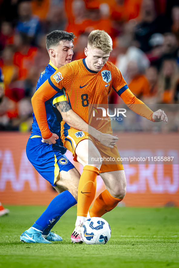 Bosnia and Herzegovina midfielder Benjamin Tahirovic and Netherlands midfielder Jerdy Schouten during the match between the Netherlands and...