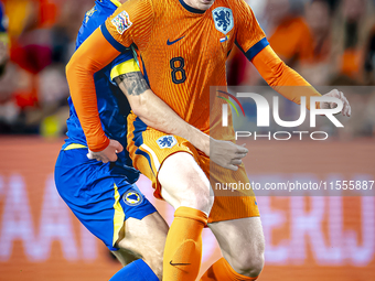 Bosnia and Herzegovina midfielder Benjamin Tahirovic and Netherlands midfielder Jerdy Schouten during the match between the Netherlands and...