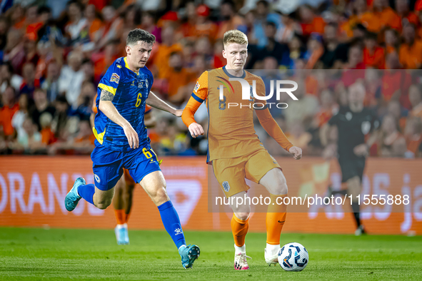 Bosnia and Herzegovina midfielder Benjamin Tahirovic and Netherlands midfielder Jerdy Schouten during the match between the Netherlands and...