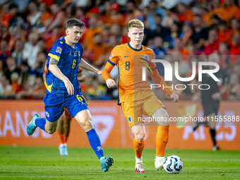 Bosnia and Herzegovina midfielder Benjamin Tahirovic and Netherlands midfielder Jerdy Schouten during the match between the Netherlands and...