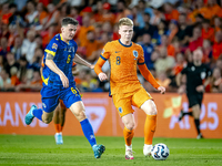 Bosnia and Herzegovina midfielder Benjamin Tahirovic and Netherlands midfielder Jerdy Schouten during the match between the Netherlands and...