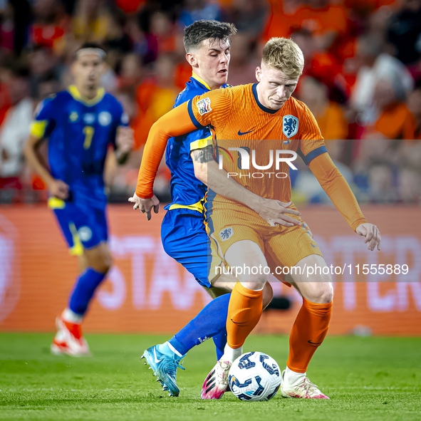 Bosnia and Herzegovina midfielder Benjamin Tahirovic and Netherlands midfielder Jerdy Schouten during the match between the Netherlands and...